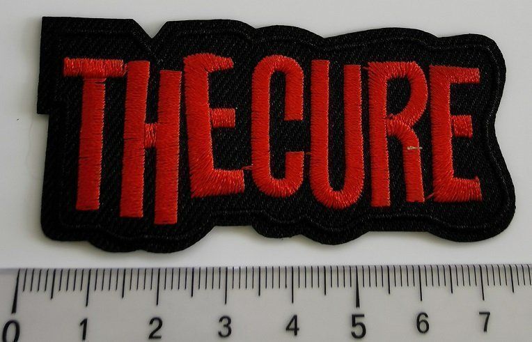 Toppe: The Cure - Aufnäher (neu) – Nuovo e nell'imballaggio originale da Wilen b. Wollerau venduto da morethanmusic