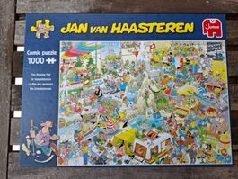"Die Urlaubsmesse" Puzzle von Jan van Haasteren