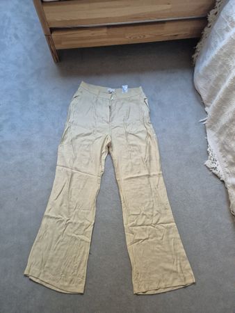 H&M Hose weit geschnitten beige Grösse 44 guter Zustand