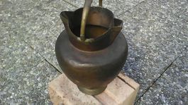 ancien récipient servant à récolter l'alcool 2 becs.