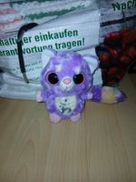 Plüschtier Katze lila mit grossen Augen gebrauchter Zustand