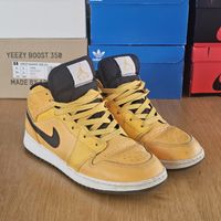 sneakers Nike Air Jordan 1 Mid jaune noir taille 7y eur40