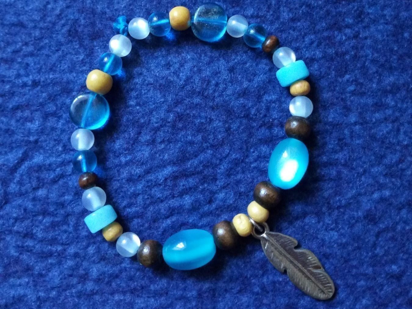 Bracciali & Braccialetti: Modeschmuck/Armband mit Federanhänger – Nuovo (secondo la descrizione) da Beckenried venduto da Havacola 4