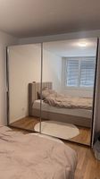 Kleiderschrank mit Schwebetür