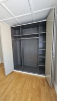 Kleiderschrank mit Falttüren 180x220x60