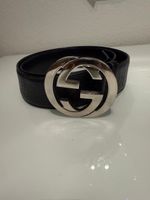 Ceinture Gucci noire avec boucle logo argentée cuir