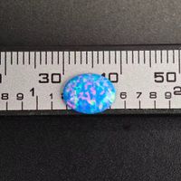 Opal Synthetik oval blau mit Glitzer in Schmuckbox 6mm x 8mm