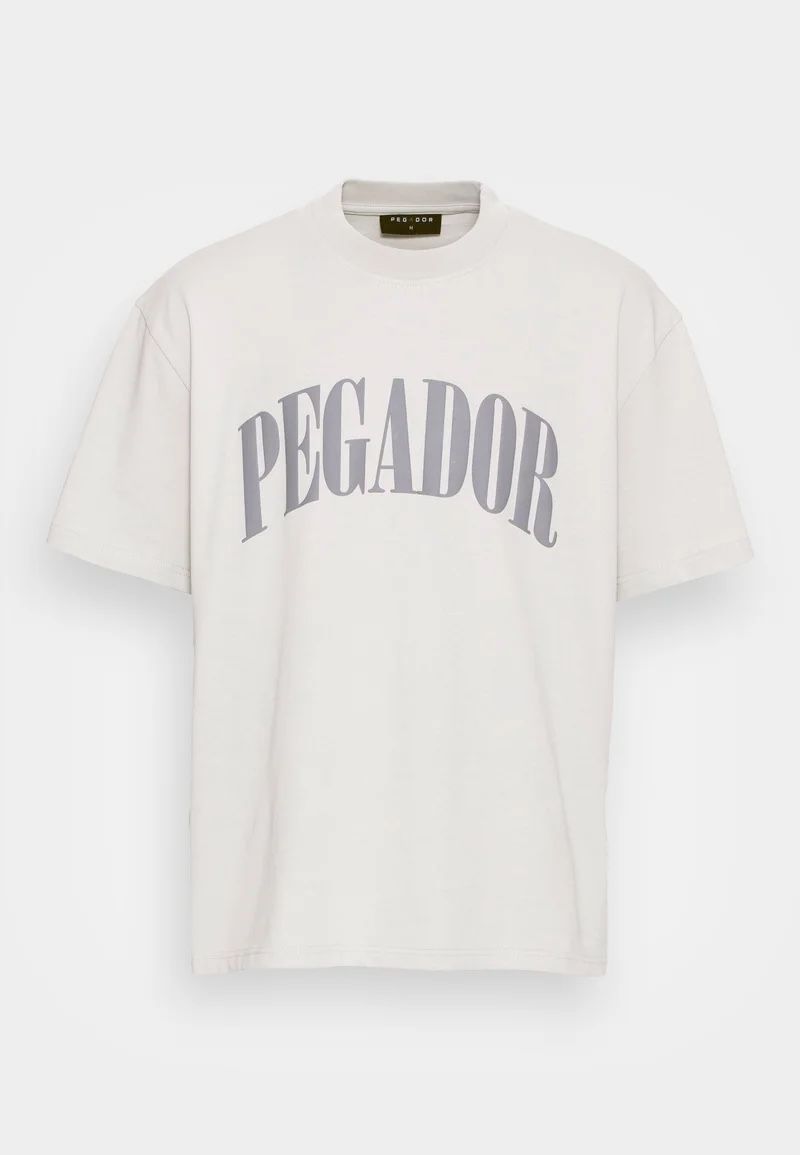 Pegador T-shirt: Oversized Pegador Tee – Usato da Chur venduto da dajan.17