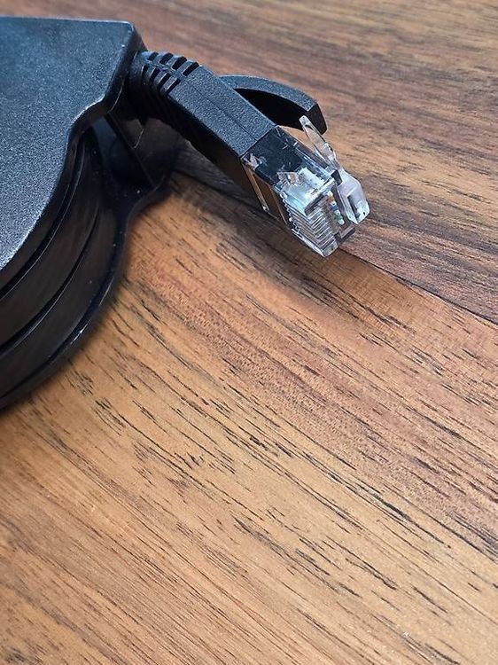 Cavi: REXLIS RJ45 LAN Kabel aufrollbar schwarz – Usato da Dietlikon venduto da Bonamesa 1