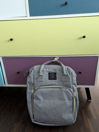Faltbarer Wickelrucksack mit integrierter Liegefläche
