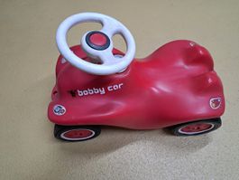 Roter Bobby Car mit Lenkrad, voll funktionsfähig