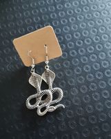 Boucles d'oreilles serpent argenté état neuf