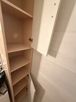 Tall narrow storage cabinet
