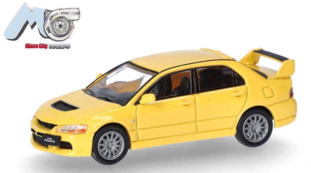 Mitsubishi Modellini d'auto: Herpa 87MC000004 1:87 Mitsubishi Lancer Evolution 9 gelb – Nuovo e nell'imballaggio originale da Neukirch a.d. Thur venduto da MoBa-Artikel.ch