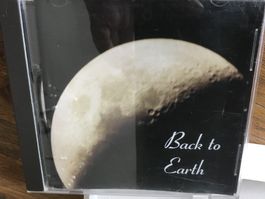 CD Back to Earth.  💿