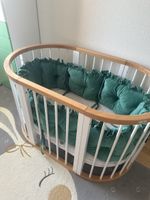 Oval bed growing with the baby