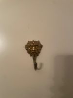 Kleiderhaken goldener Löwe
