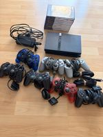 Playstation 2 Konsole mit Spielen und Controllern