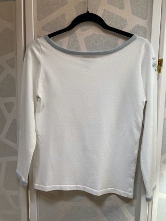 Joli pull blanc avec motif. XS
