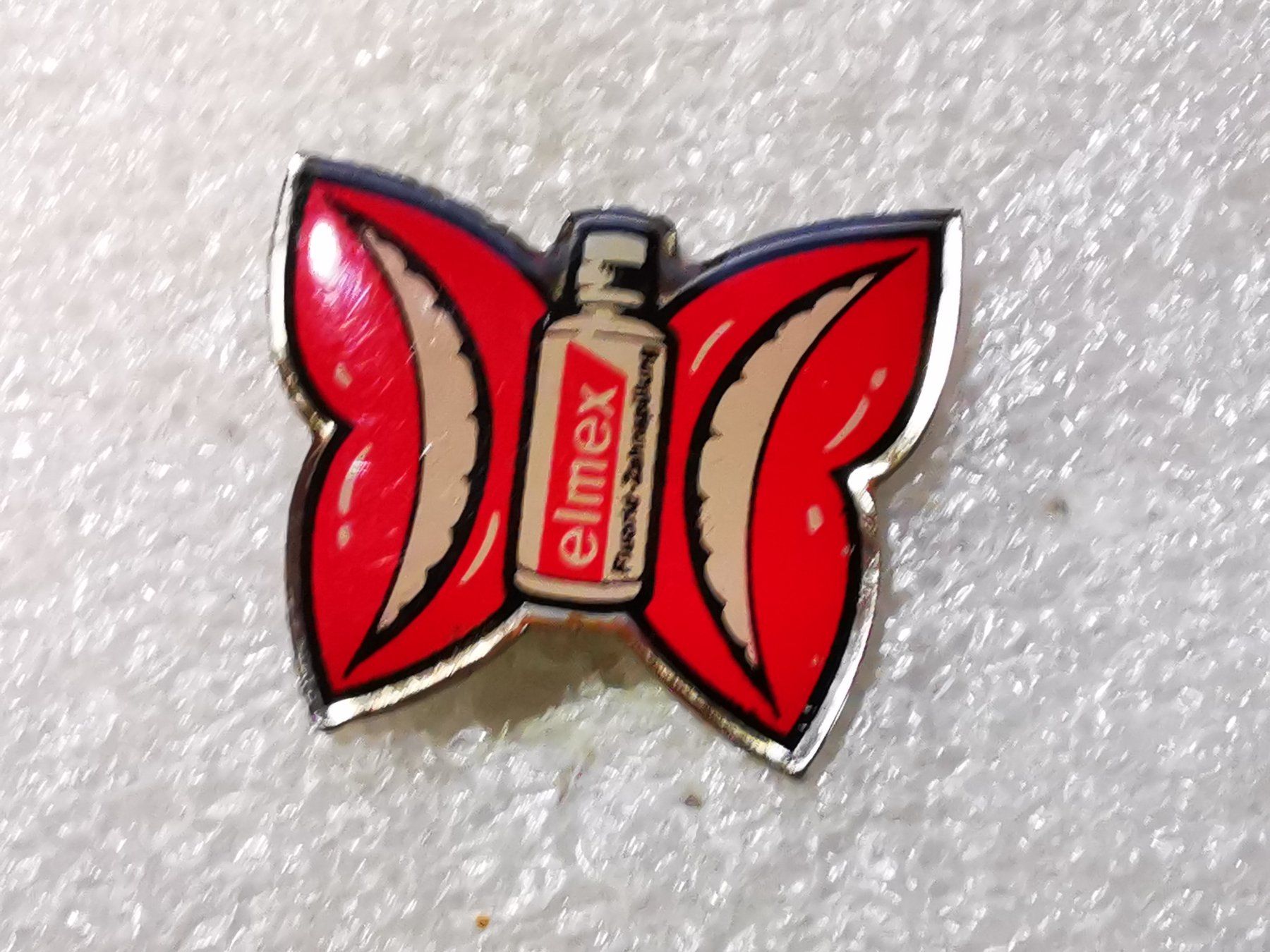 Placchette & Badge: Ansteckpin 52: Elmex – Usato da Oppligen venduto da Pin-Fall-Shop