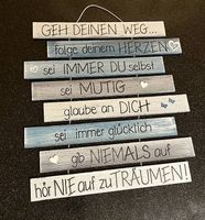 Holzschild mit Spruch