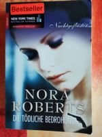 Nora Roberts, Nachtgeflüster, Die tödliche Bedrohung