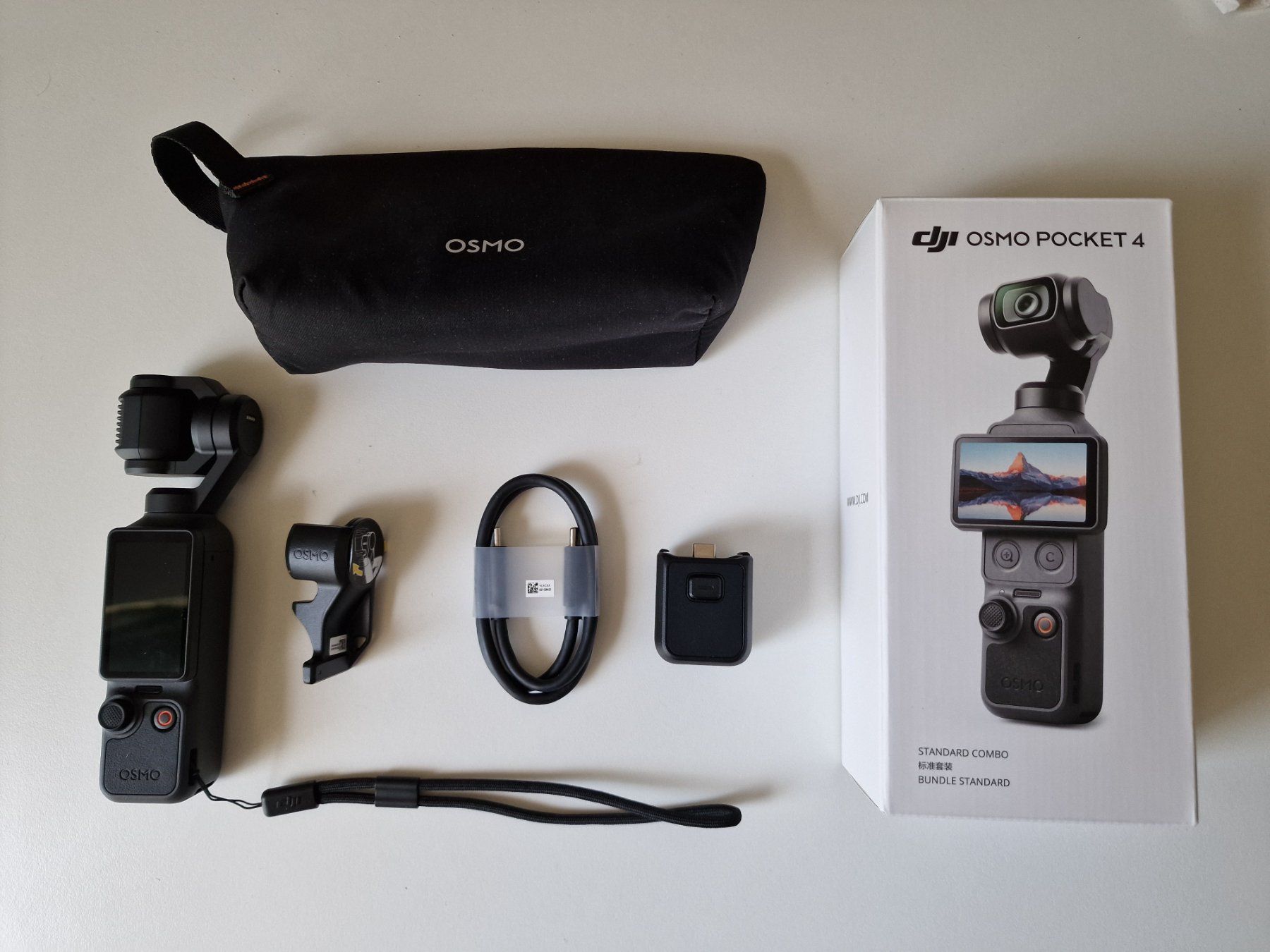 DJI Caméscopes: DJI Osmo Pocket 4 Standard Combo – D'occasion à Neuchâtel par Looseboy