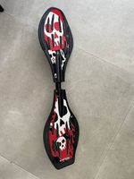 Skate waveboard/caster board en très bon état