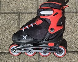 Inline Skates Grösse 28-31, schwarz rot mit Schonern