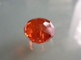 Glasschliffperle facett. 10x7mm orange