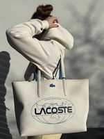 Grosse weisse Lacoste-Einkaufstasche mit Kosmetiktasche