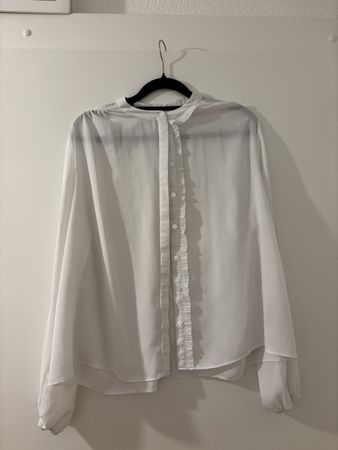 Chemisier blanc manches longues col officier bon état