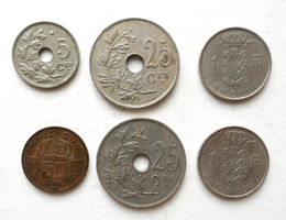 7 belgische Münzen 1x 5 Cent, 2x 25 Cent 1x 50 Cent, 3x 1 Fr