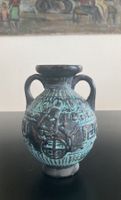 Vase en céramique noir avec décorations en turquoise