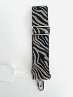 Taschengurt Zebra Muster schwarz beige mit silber Verschluss