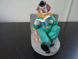 Sitzender Clown