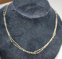 Lange Kette, Silber vergoldet mit Onyx