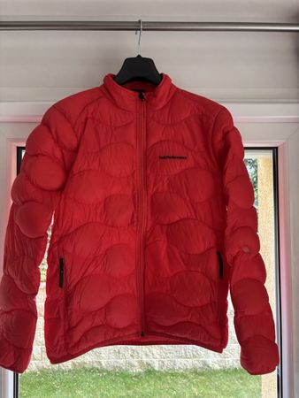 Doudoune Peak Performance rouge comme neuve
