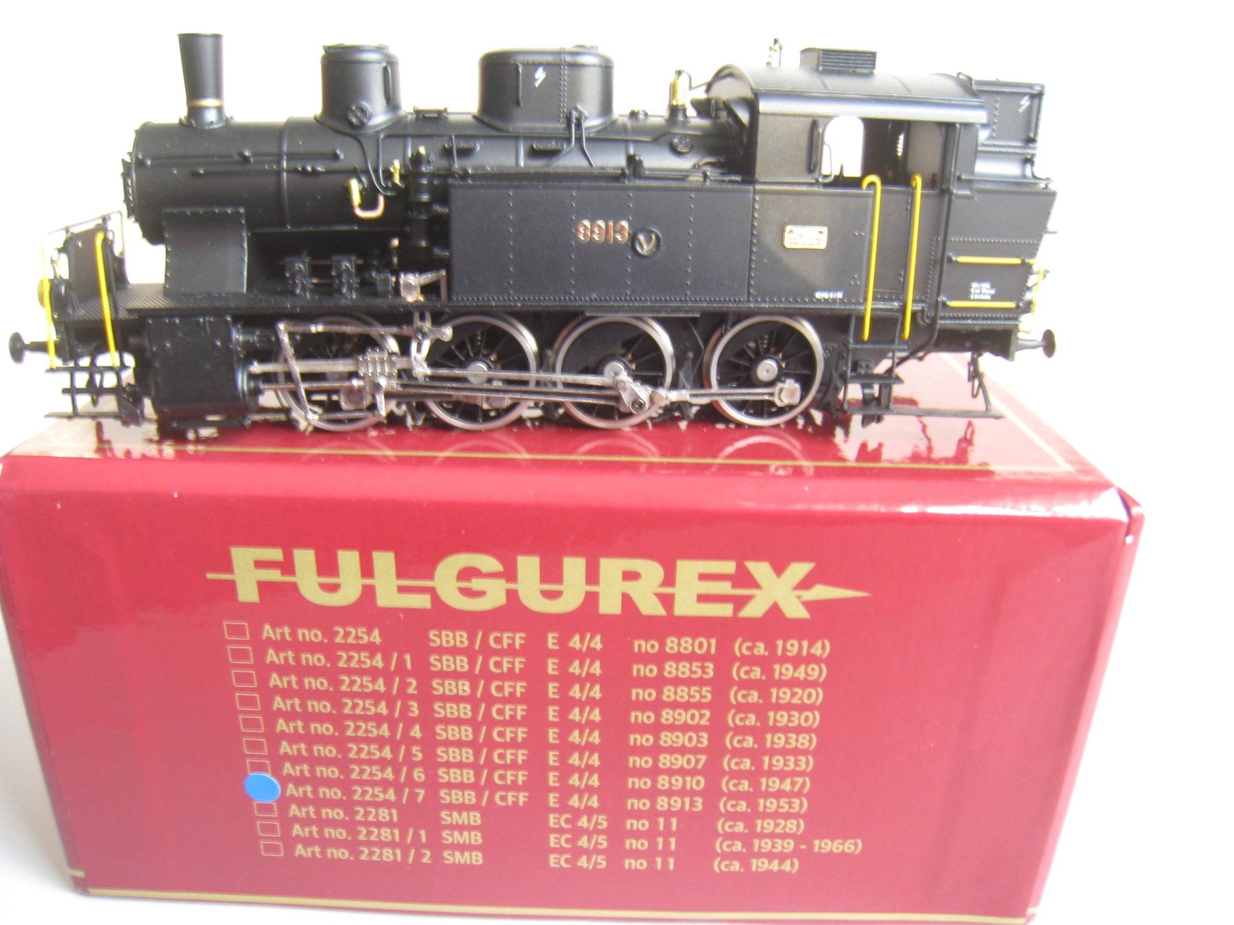 Fulgurex Modelleisenbahnen: Fulgurex, E 4/4 8801 mit grau/blauem Kessel oder E 4/4 8913 – Gebraucht aus Buchs ZH von swiss-train 9