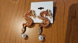 2 grandi orecchini dragoni (nuovi)