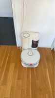 Saugroboter mit Absaugstation