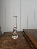 Glasthermometer mit farbigen Kugeln