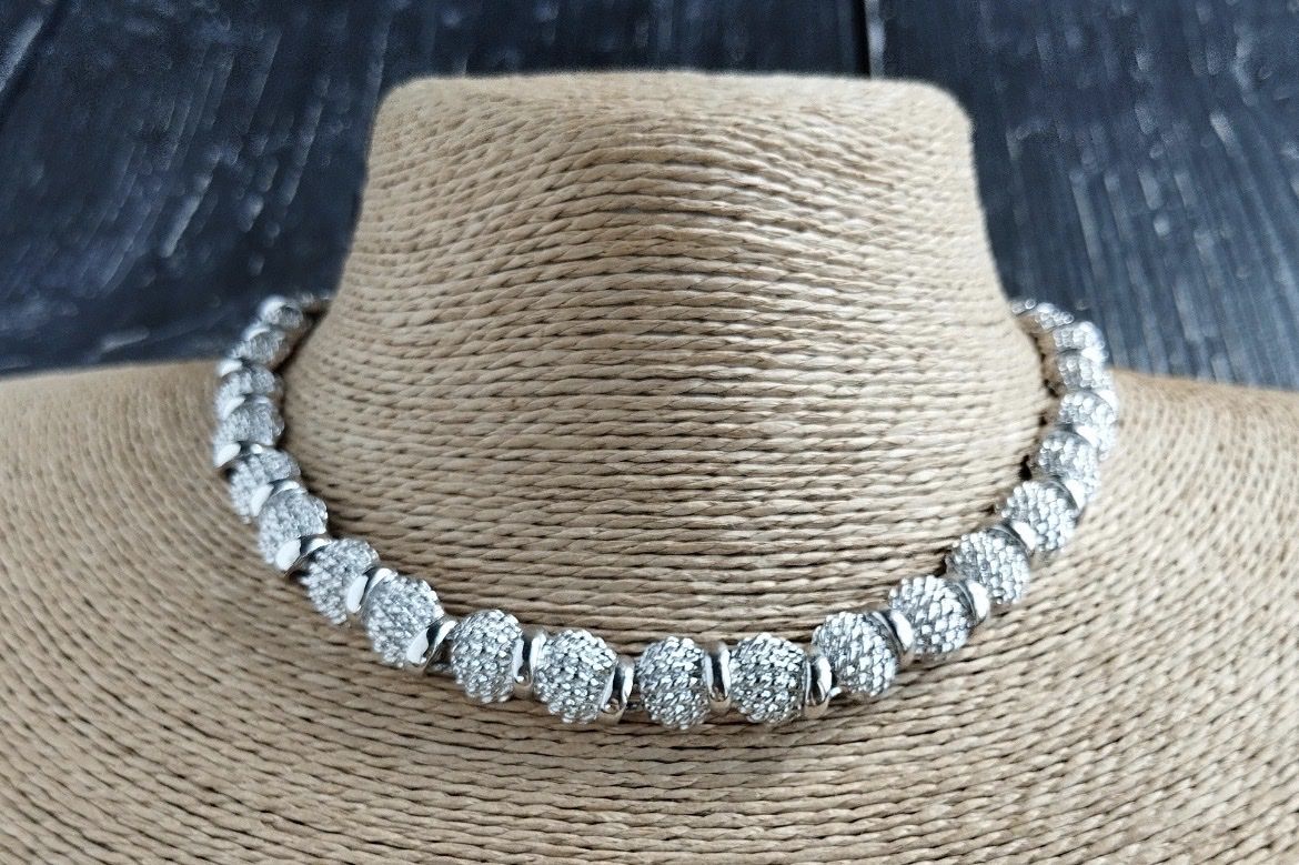 Catenine: Vintage Monet necklace in silver colour – Usato da Lucens venduto da metaD 2