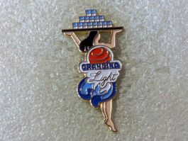 Ansteckpin 173: Orangina