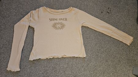 Pullover mit Sonne