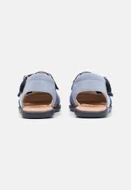 Ugg Scarpe per ragazzi: UGG Kinder Sandalen Hausschuhe Grössen 22, 27.5 oder 28.5 – Nuovo e nell'imballaggio originale da Riniken venduto da Babeli78 3