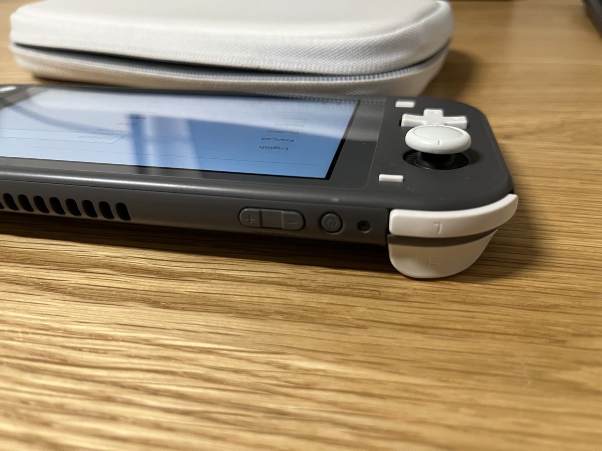 Nintendo Console: Nintendo Switch Lite Grau mit Etui Case – Usato da Olten venduto da T.Frei 3