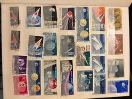 Briefmarkenalbum mit diversen Briefmarken