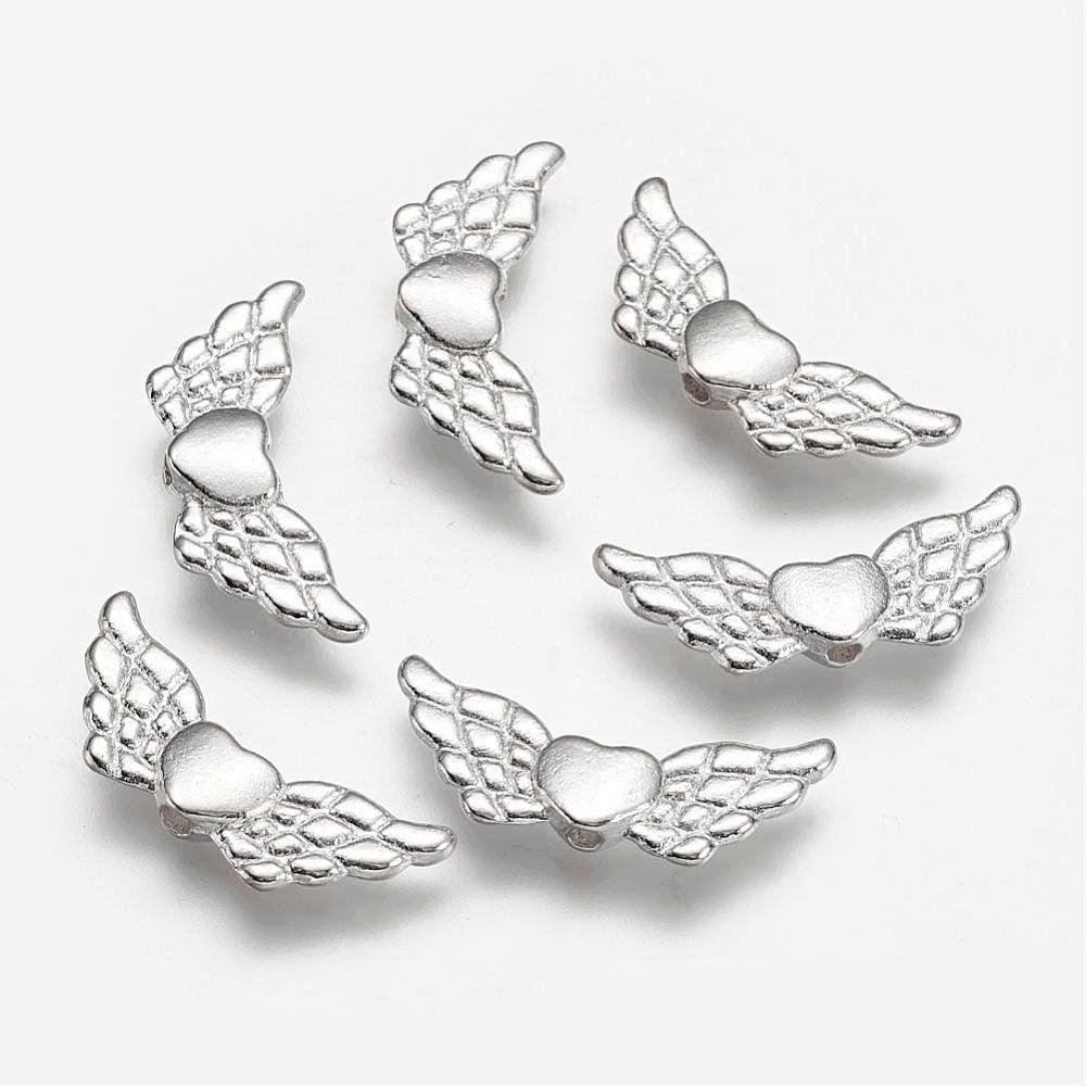 Perle (finte): 5 Flügel  mit Herz 22x9mm versilbert – Nuovo (secondo la descrizione) da Alpnachstad venduto da perlengaby 1