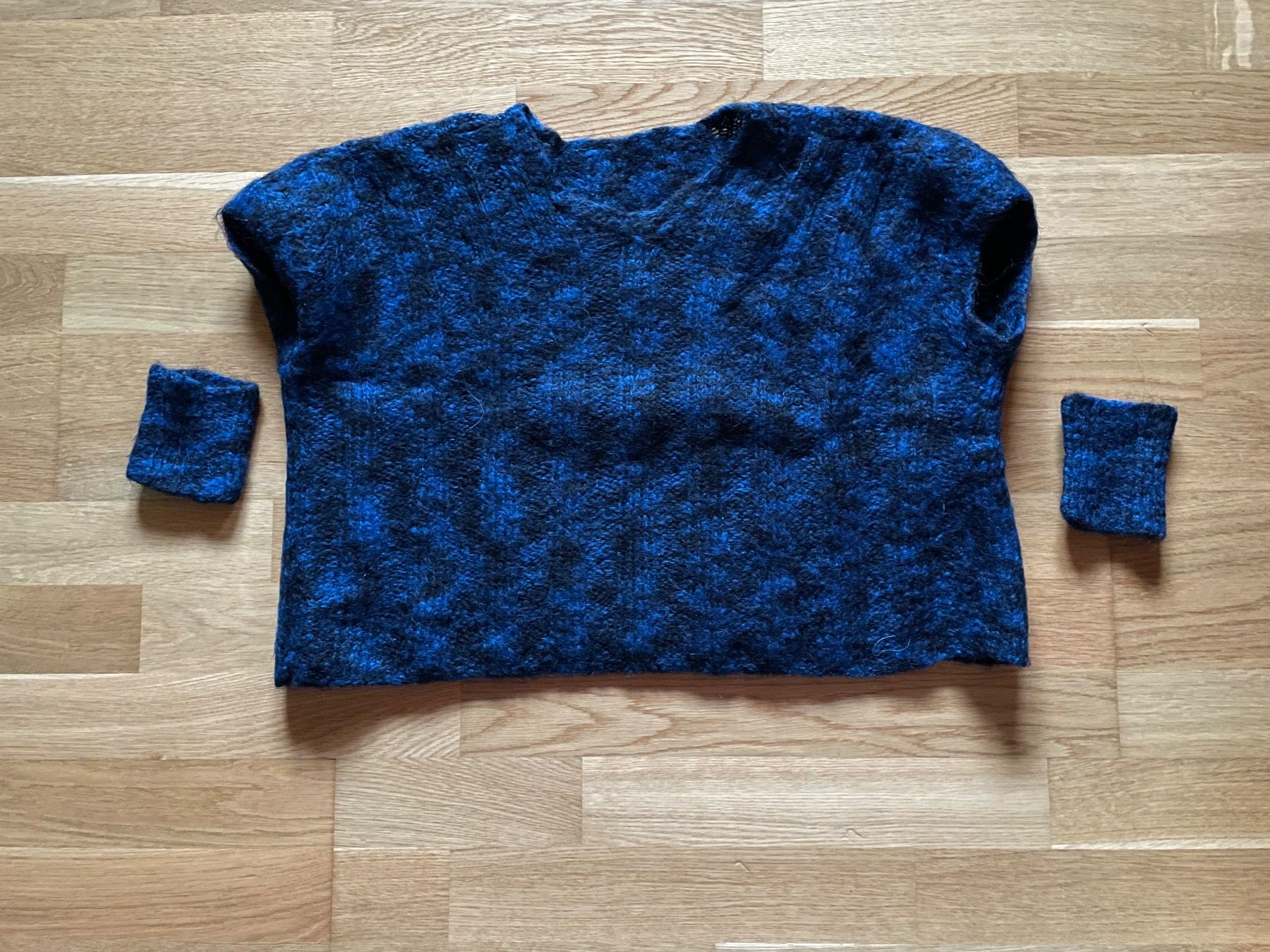 Top: Woll-Pullunder, blau-schwarz meliert, mit Pulswärmern – Usato da Olsberg venduto da iri_pn9t